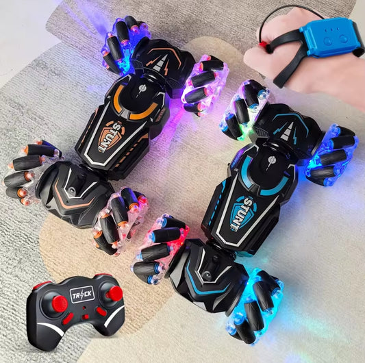 4x4 RC stunt car performing 360-degree flip on rugged terrain with colorful wheels